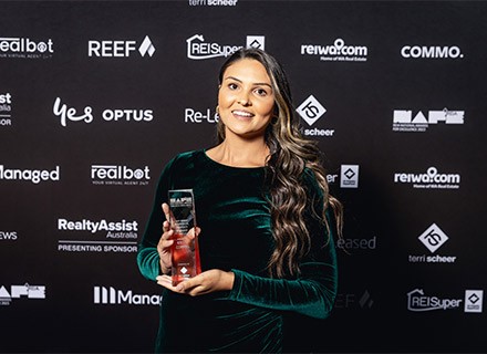 kristy showing reiwa awards trophy