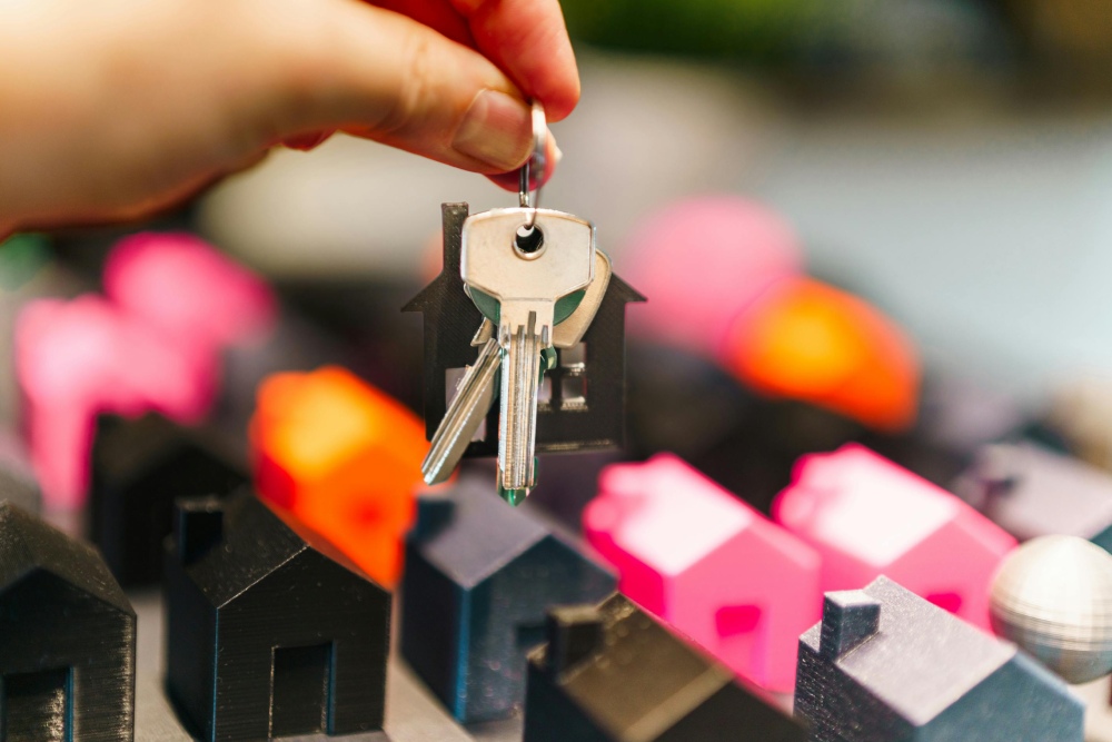 Photo of keys over housing icons