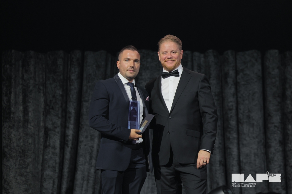 Accepting PPM's Commercial Property Manager Of The Year trophy at the 2026 REIA National Awards For Excellence